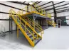 16′ x 30′ equipment platform with Resindek flooring, an IBC stair system, handrails, and a 6-foot slide gate.